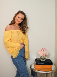 yellow bardot off the shoulder textured top holiday inspo