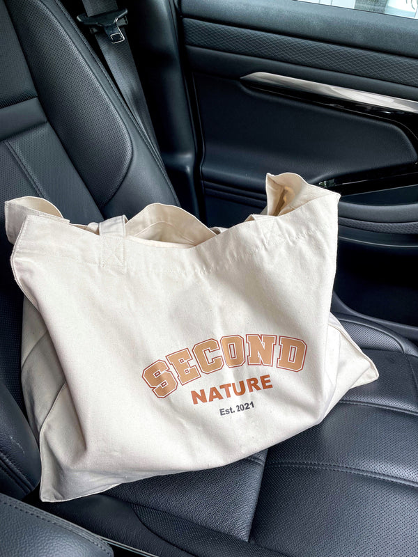 Luxury Natural canvas tote bag with Second Nature college style logo