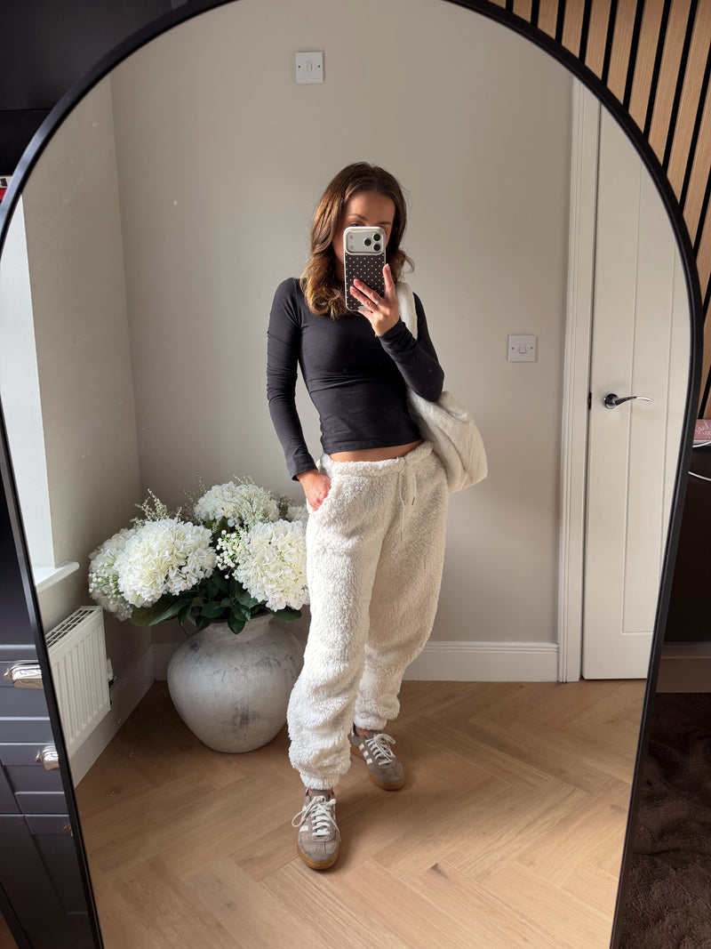 Fleecy cream joggers with elasticated cuffs.