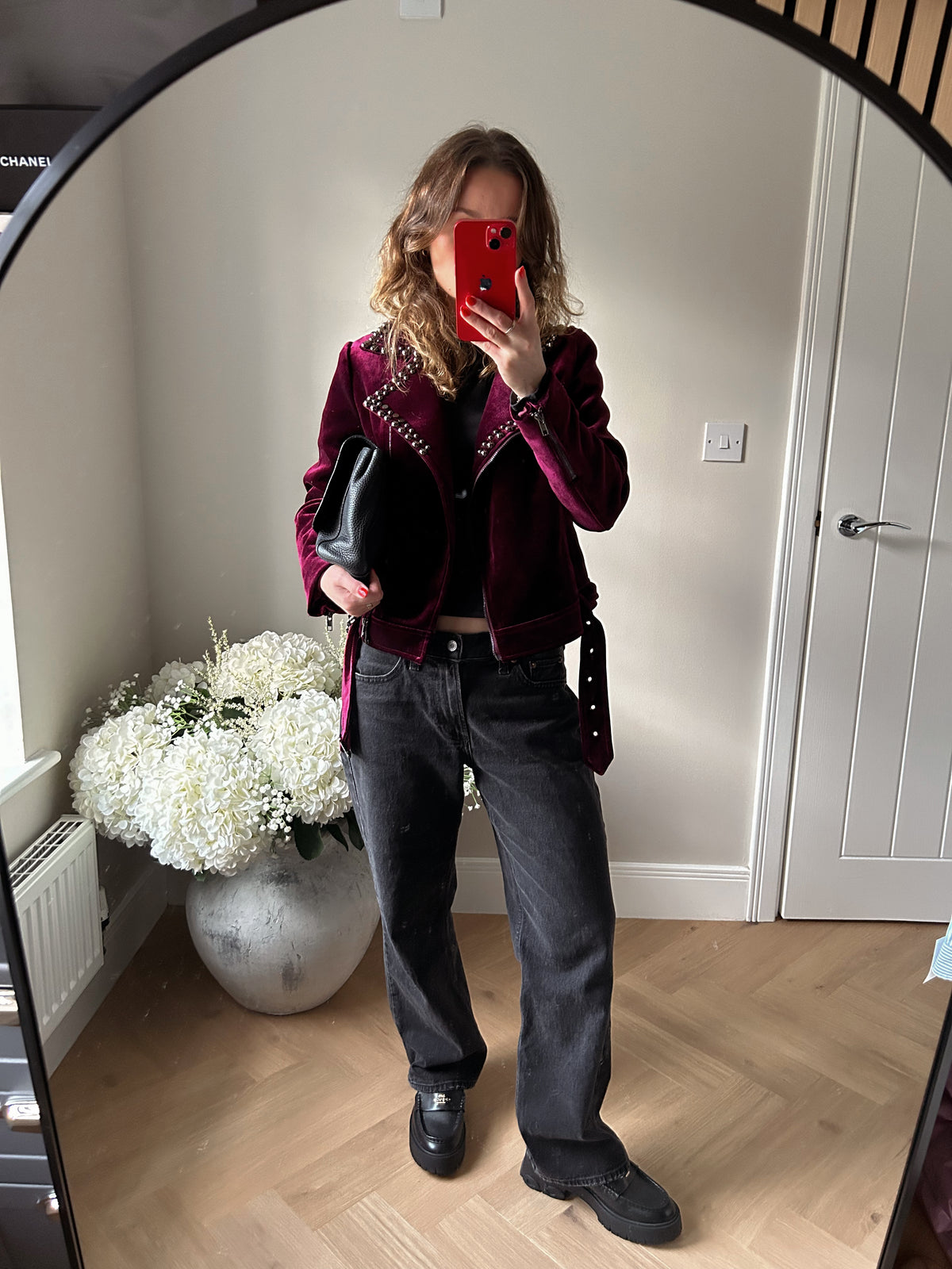 Velvet cropped bike jacket in burgundy with charcoal studded detailing on lapels.
