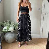 Polka Dot Pleated Midi Skirt in Black